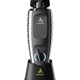 Andis electric trimmer with charging base on a white background
