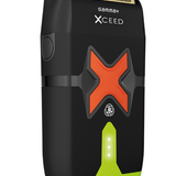 Black and gold electric shaver with orange 'X' design on a white background