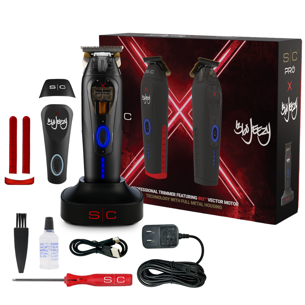 Cordless hair trimmer kit in retail box with attachments, black trimmer and blue lights